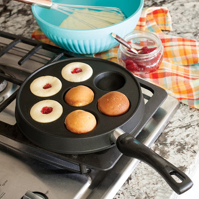 Nordic Ware Ebelskiver Pan available at American Swedish Institute.