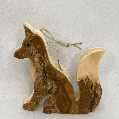 Bark Sitting Fox Tail Up Ornament available at American Swedish Institute.