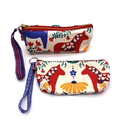 Stellar Handcrafted Goods Medium Dala Wristlet  available at American Swedish Institute.