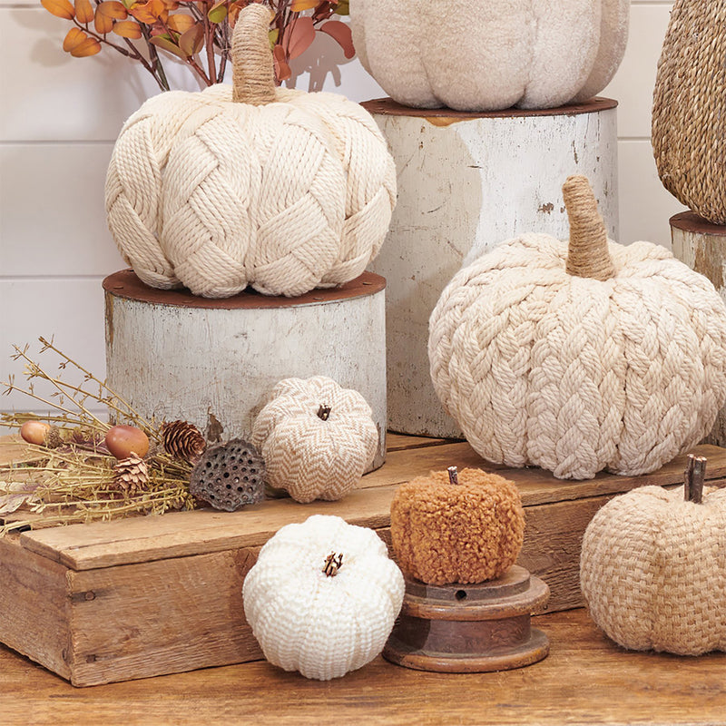 Knitted Pumpkin Set available at American Swedish Institute.