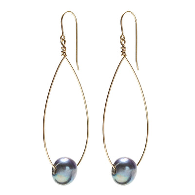 Large Oval Pearl Earrings by in2 design available at American Swedish Institute.