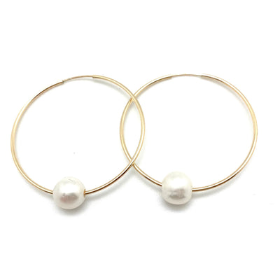 Mia Pearl Hoop Earrings by in2 design available at American Swedish Institute.