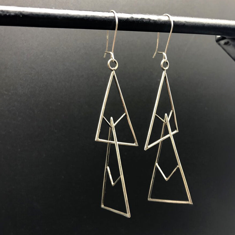 Intertwined Triangles Earrings by Gina Mount available at American Swedish Institute.