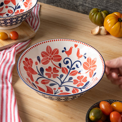 Red and Navy Bird Stamped Bowl available at American Swedish Institute.