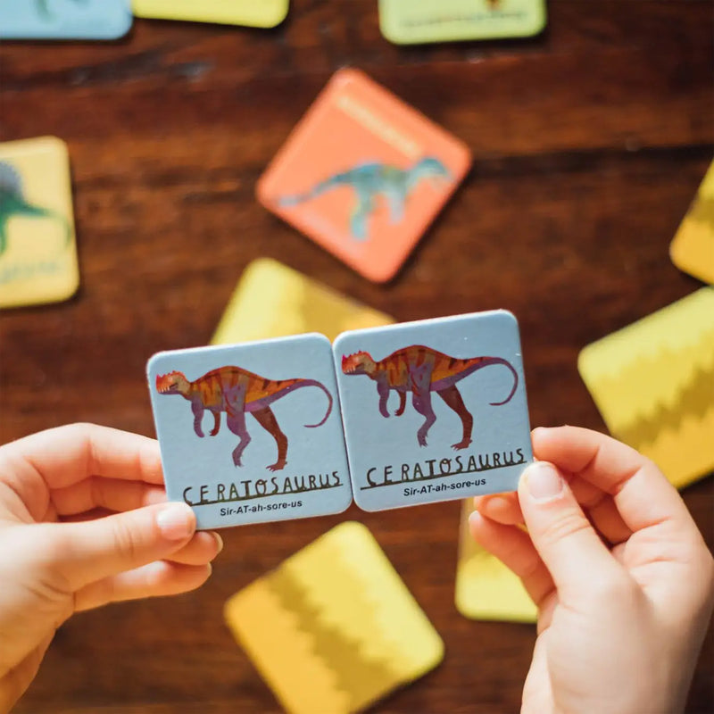 Dinosaurs Little Memory & Matching Game available at American Swedish Institute.