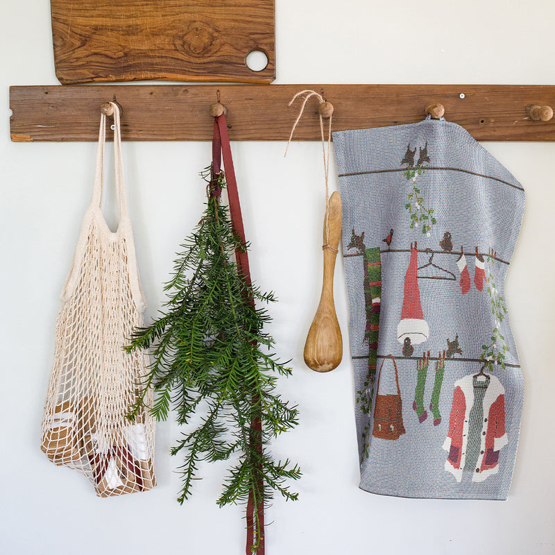 Ekelund Tomtelina (Santa Clothesline) Tea Towel available at American Swedish Institute.