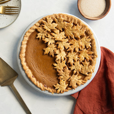 Nordic Ware 12 Inch Leaves & Apples Reversible Pie Top Cutter available at American Swedish Institute.