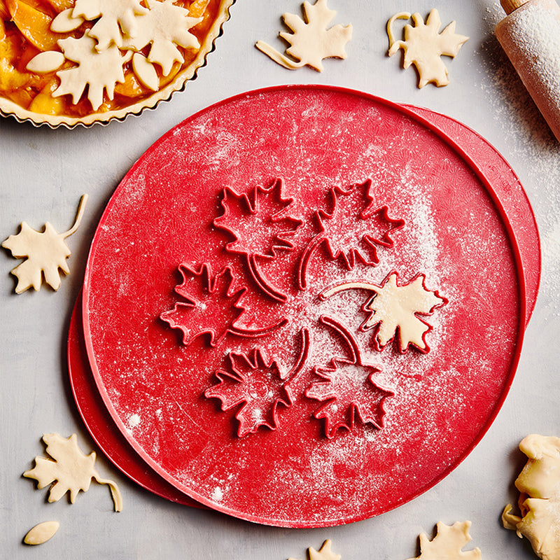 Nordic Ware 12 Inch Leaves & Apples Reversible Pie Top Cutter available at American Swedish Institute.