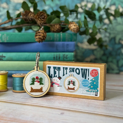 Let It Snow! Mini Matchbox Christmas Cross Stitch Kit available at American Swedish Institute.