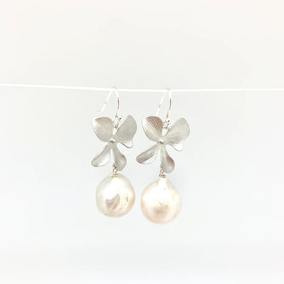 in2 design Disa Short Earrings available at American Swedish Institute.