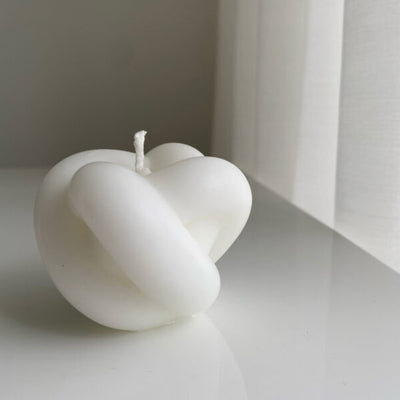 Knot Candle by veke available at American Swedish Institute.
