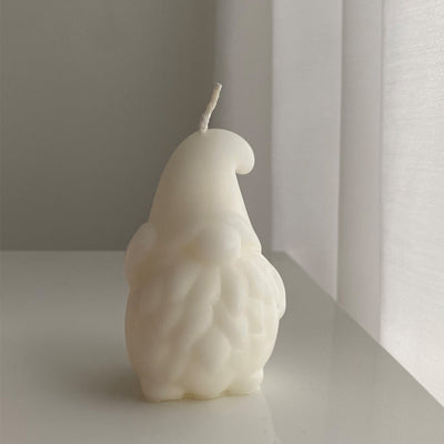 Tomte Candle by veke avaiiable at American Swedish Institute.