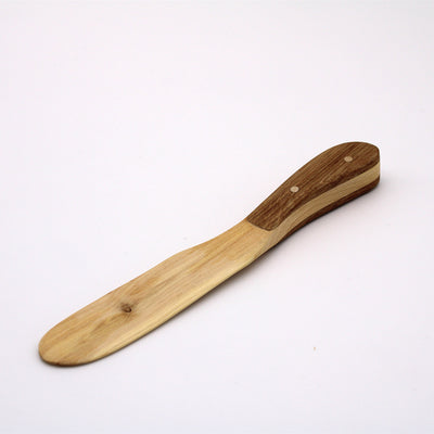 Two-toned Wood Spreader available at American Swedish Institute.