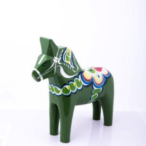 Green handcrafted Dala Horse available at American Swedish Institute.