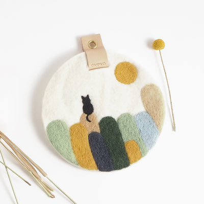 Wool Cat on Kullaberg Trivet available at American  Swedish Institute.