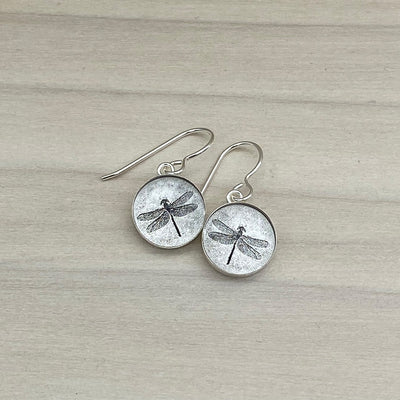 Dragonfly Bezel Earrings available at American Swedish Institute.