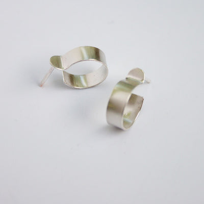 Paloma Earrings (Small, Silver) by Dottir available at American Swedish Institute.