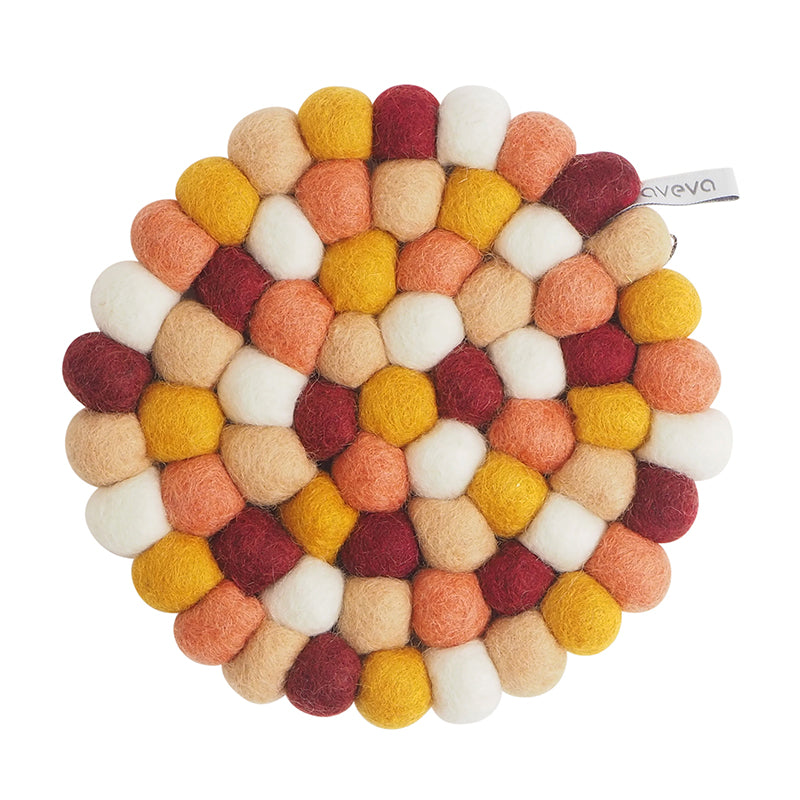 Aveva Round Wool Trivet (Indian Summer) available at American Swedish Institute.